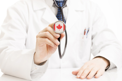 聴診器とカナダの国旗