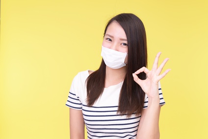 風邪に罹患した女性